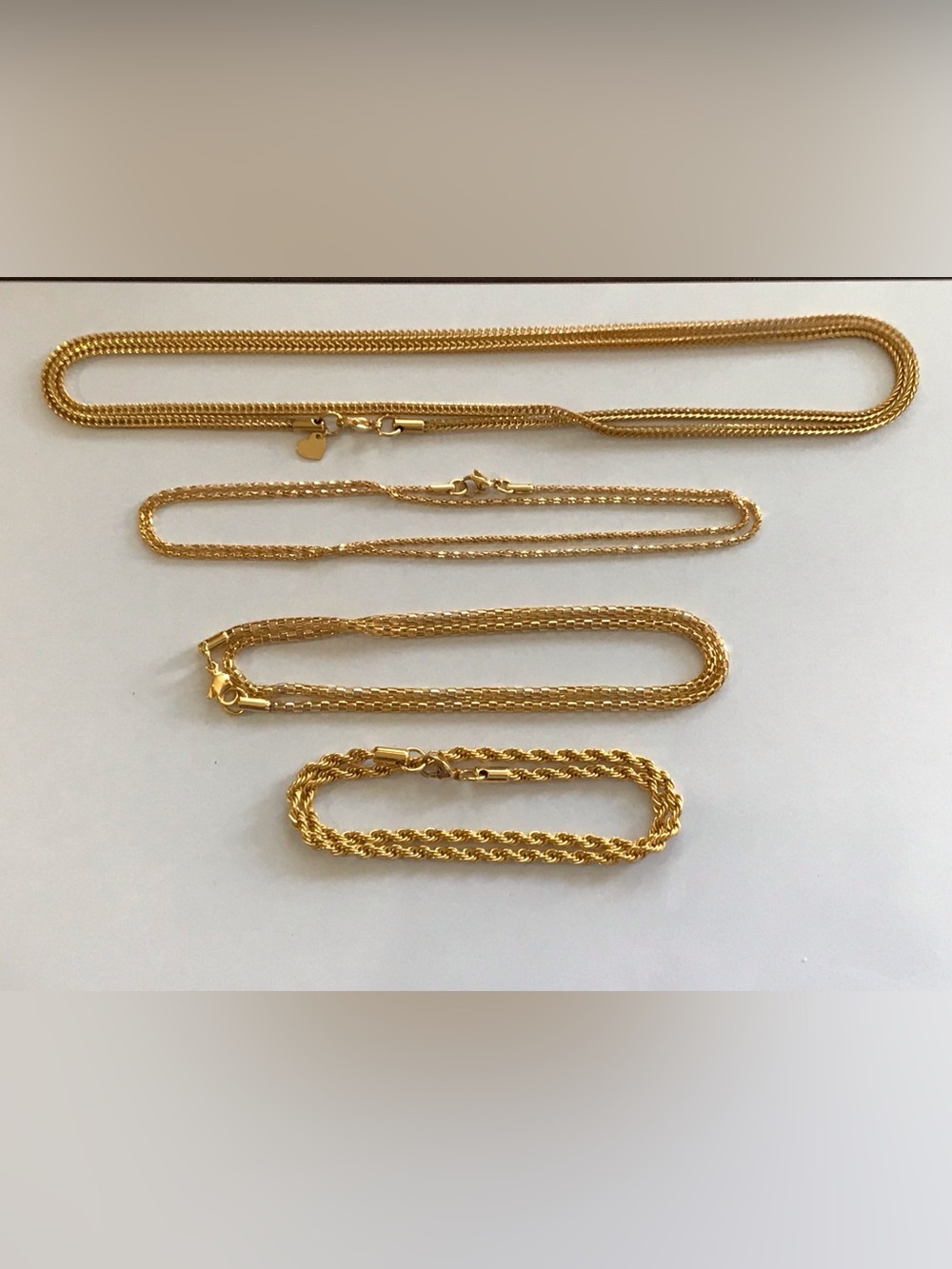 Set of Four Gold Clad Stainless Steel Necklaces